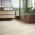 Green, nature-inspired bathroom with Stratus lvt stone floors