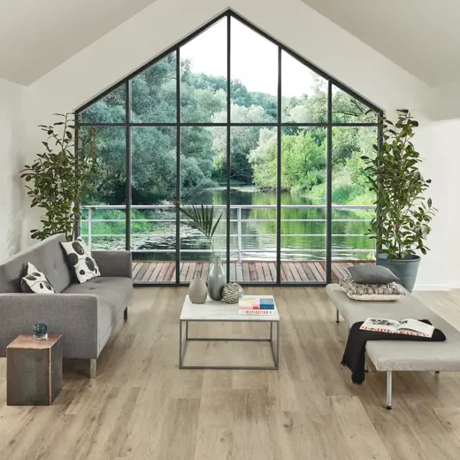 Van Gogh Baltic Washed Oak mid brown LVT flooring in a living room