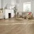 Van Gogh Canadian Urban Oak mid brown LVT flooring laid in a living room