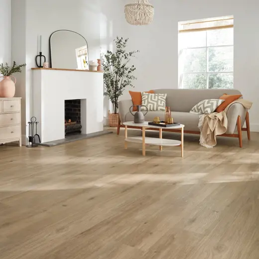Van Gogh Canadian Urban Oak mid brown LVT flooring laid in a living room