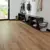 Van Gogh Canadian Urban Oak mid brown LVT flooring laid in a hallway passage